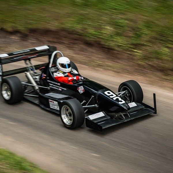 Best of British 2019, Shelsley Walsh, #37 black single seat racing car on shelsley walsh hill climb at speed