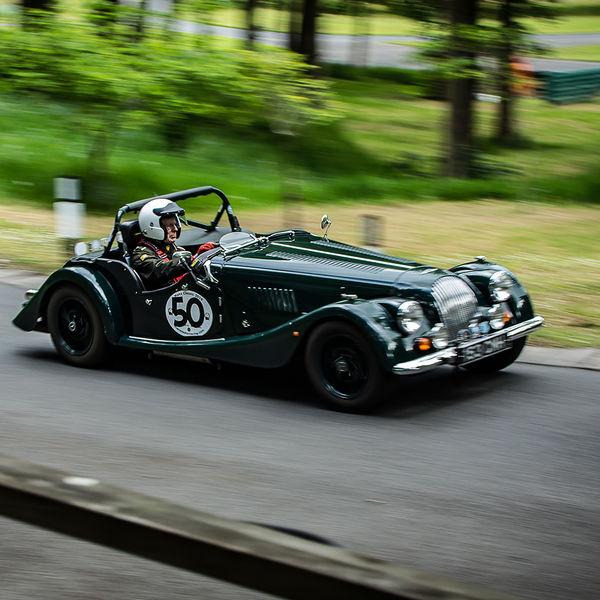 La Vie en Bleu 2019, Prescott Speed Hill Climb, #24 green morgan classic racing car travelling at speed up prescott hill climb