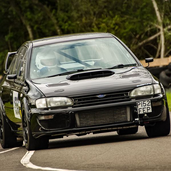 Curborough Sprint Championship 2019 - Round One - #05 black subaru impreza at speed through molehill corner at curborough sprint track