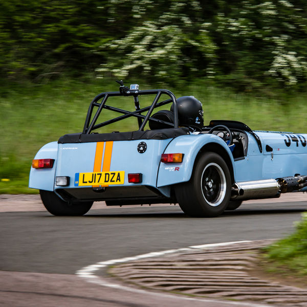 Lotus 7 Club Speed Championships, Curborough, #19 Caterham 7 in gulf racing colours exiting flagpole corner at curborough sprint course