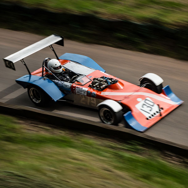 Best of British 2019, Shelsley Walsh, #20 red and blue classic single seat racing car at shelsley walsh hill climb at speed