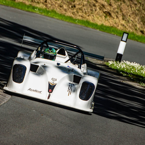 Porsche at Prescott 2019, #27 white radical sports car at speed during the porsche at prescott hill climb event