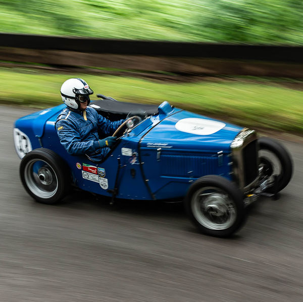 Classic Nostalgia 2019, Shelsley Walsh Hill Climb, #38 blue vintage racing car at speed on shelsley walsh hill climb circuit