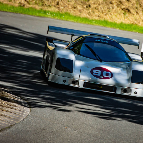 Porsche at Prescott 2019, #31 white saker prototype race car at speed during the porsche at prescott hill climb event