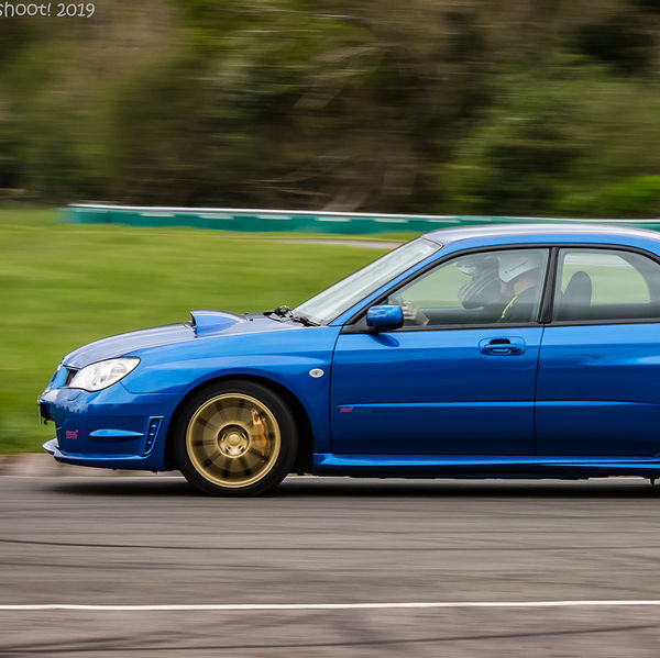 Quinton Motor Club May Track Day, Curborough, #06 Blue Subaru Impreza Sti at speed on Curborough Sprint Course