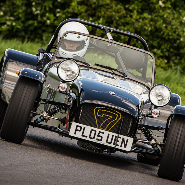 Lotus 7 Club Speed Championships, Curborough, #38 black and aluminium caterham 7 rounding the fradley hairpin corner at curborough sprint track