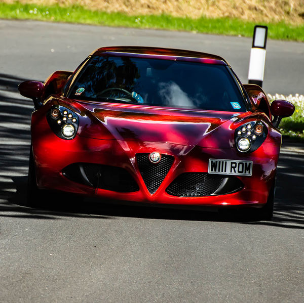 Porsche at Prescott 2019, #14 red alfa romeo 4c at speed during the porsche at prescott hill climb event