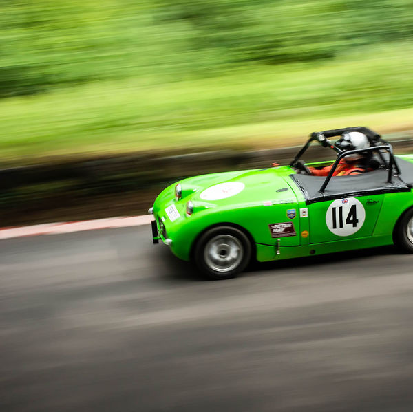 Classic Nostalgia 2019, Shelsley Walsh Hill Climb, #09 classic green austin healey frog eye sprite racing car at speed on shelsley walsh hill climb circuit