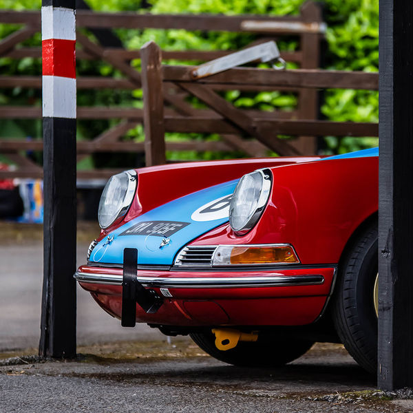Classic Nostalgia 2019, Shelsley Walsh Hill Climb, #57 red and blue classic porsche 911 racing car in the paddock at shelsley walsh hill climb circuit