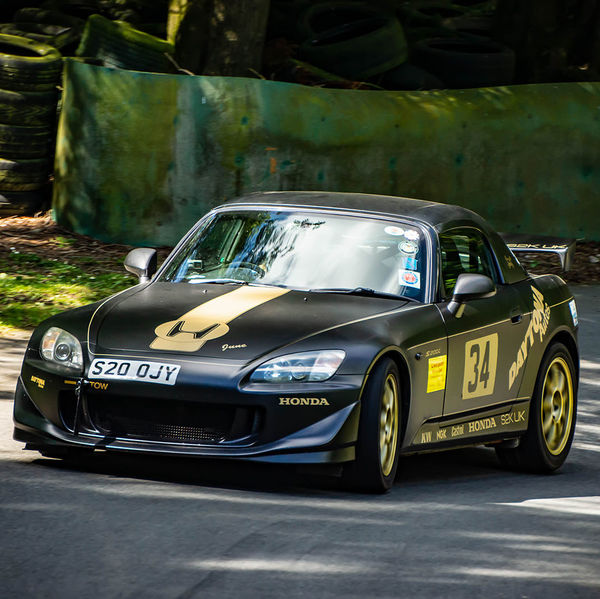 Porsche at Prescott 2019, #22 black honda s2000 at speed during the porsche at prescott hill climb event