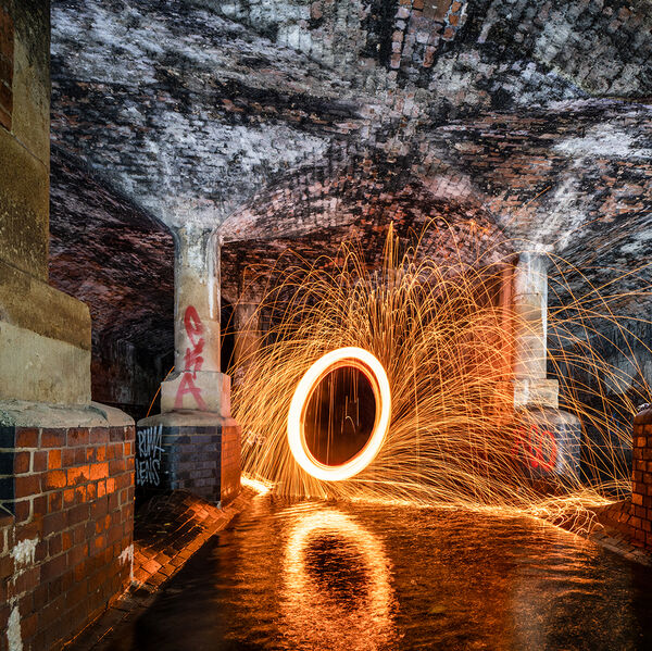 steve-shelley-ssshoot-covid-lockdown-050 urban exploring the birmingham culverts and the river rae with wire wool spinning sparks
