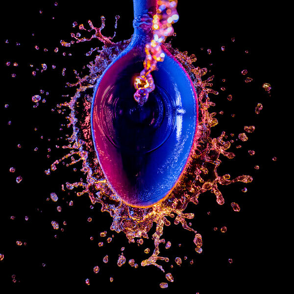 steve-shelley-ssshoot-covid-lockdown-013 water splash onto spoon with colour high speed strobe photography