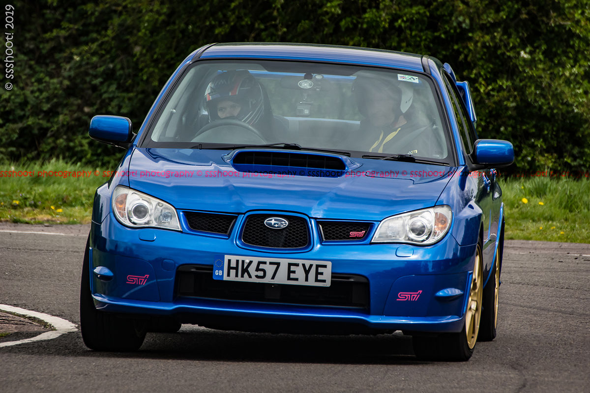 Blue Subaru Impreza Sti at speed on Curborough Sprint Course