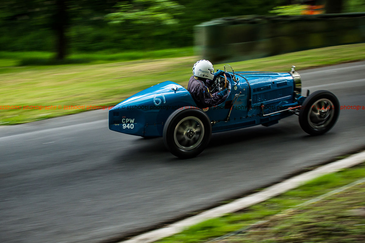 light blue type 35 vintage bugatti taking on the famous prescott hill climb at the la vie en bleu event