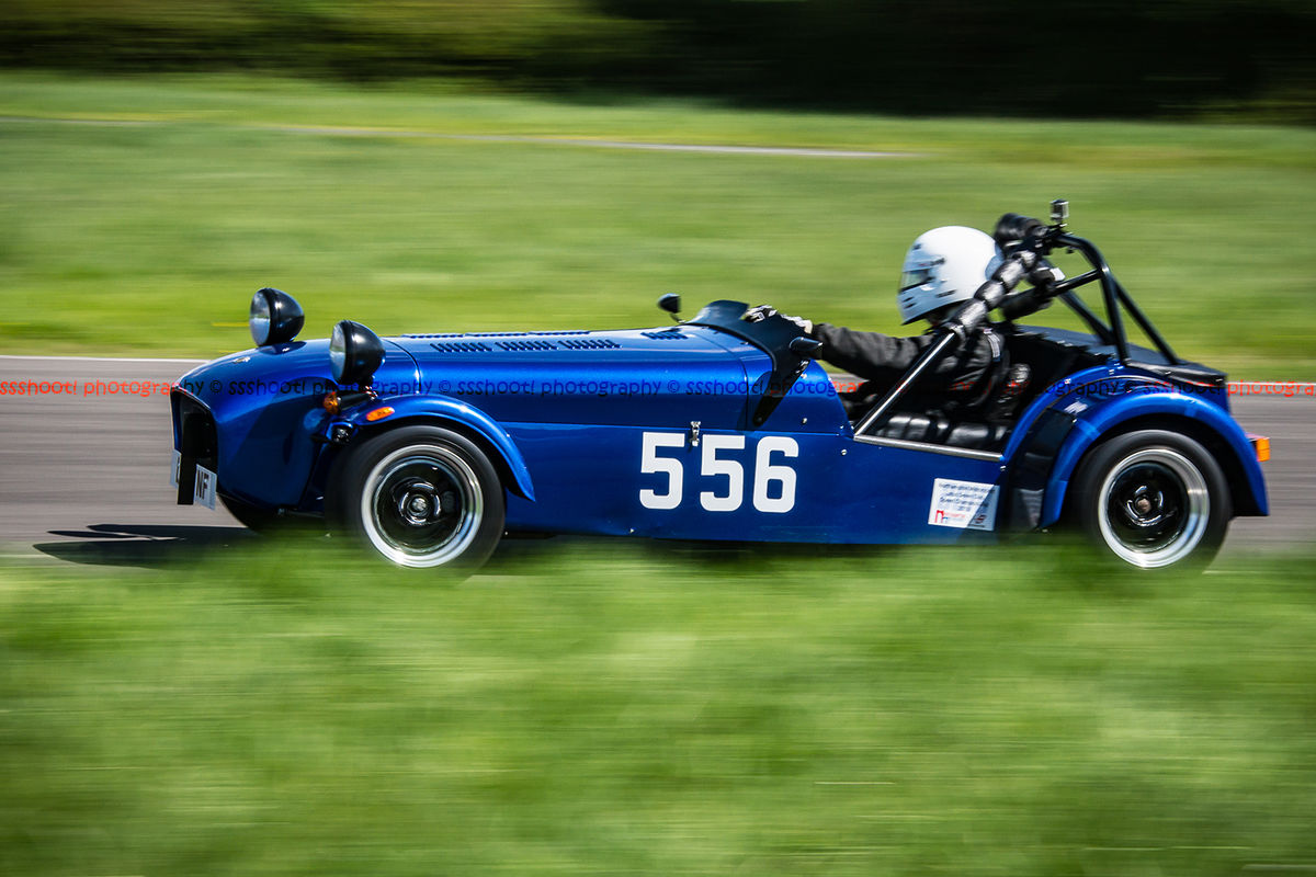 Blue Caterham 7 at speed along the Curborough sprint course shenstone straight