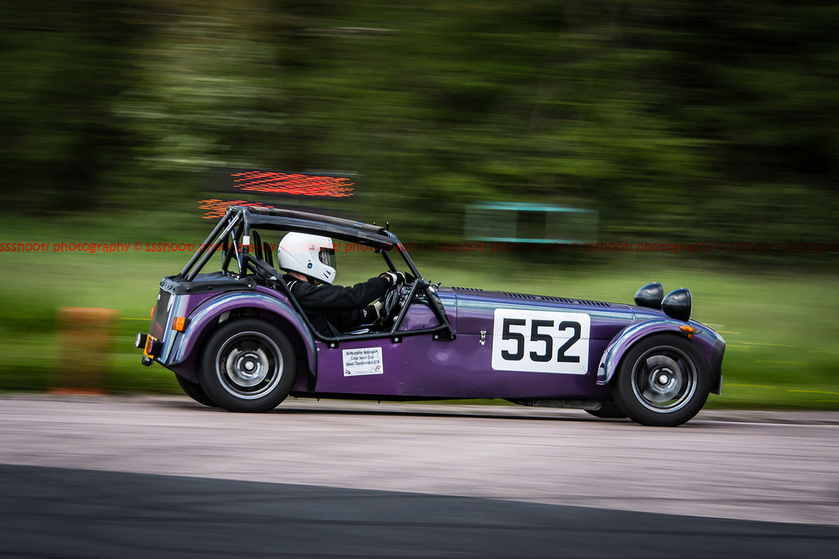 Purple caterham 7 at speed on curborough sprint track