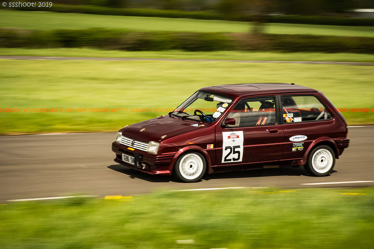 maroon mg metro at speed on curborough shenstone straight