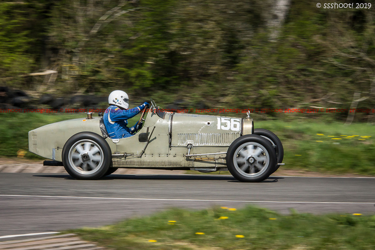 pale green vintage bugatti on curborough track at speed