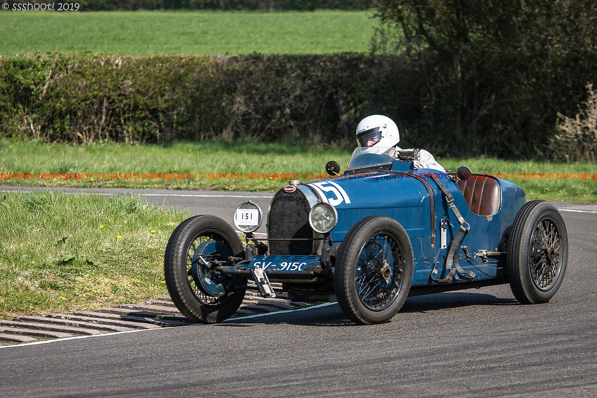 Blue bugatti vintage racing car at speed on curborough sprint course