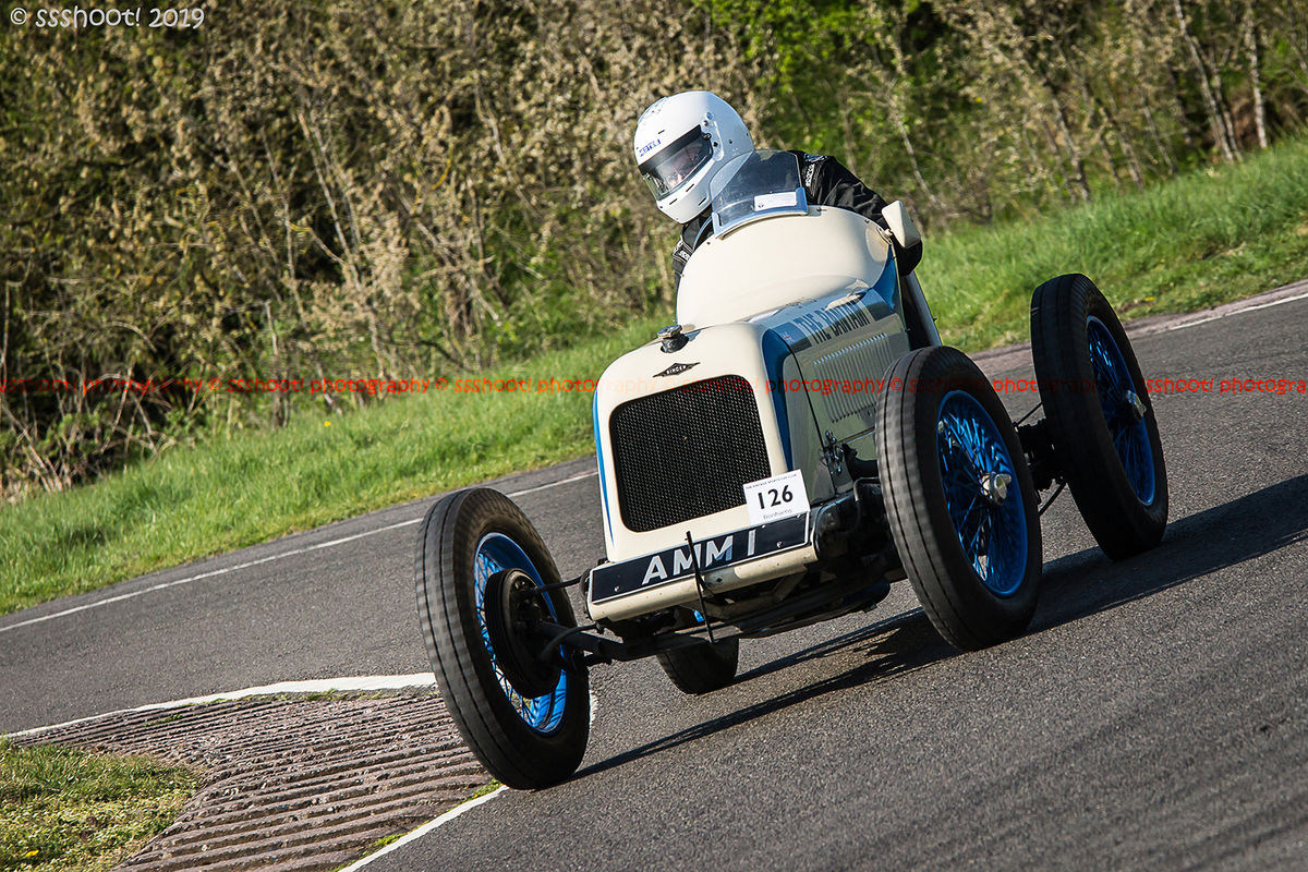 white vintage racing car at speed on curborough sprint course