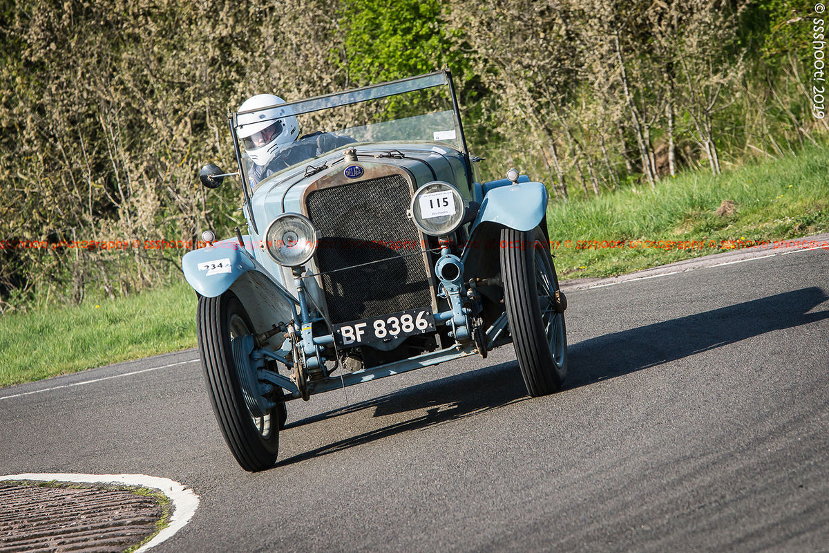 light blue Delage vintage racing car at speed on curborough sprint course