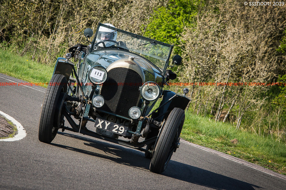 green bentley vintage racing car at speed on curborough sprint course