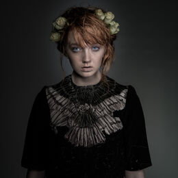 The Girl With Flowers In Her Hair