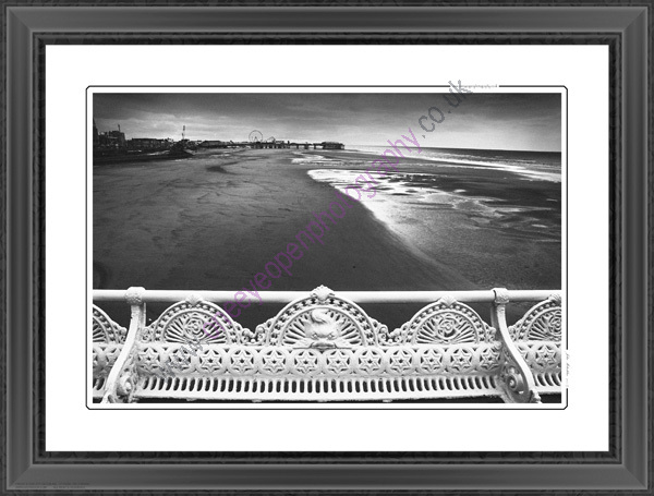 A mono view of Blackpool beach.