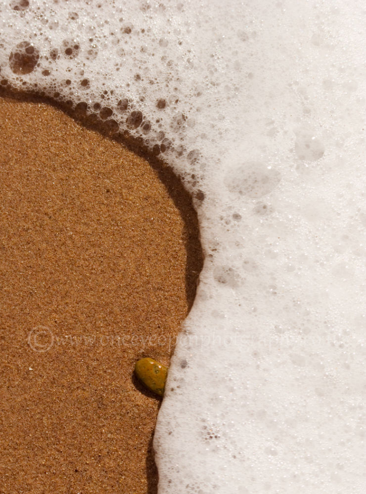 pebble on the tide