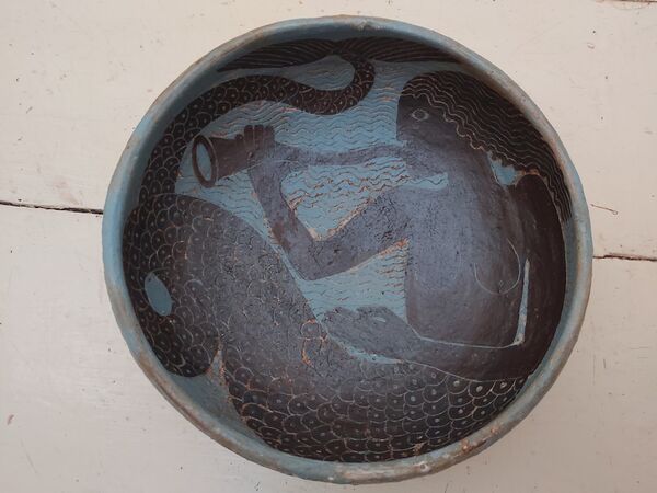 1. Swan slab pot.