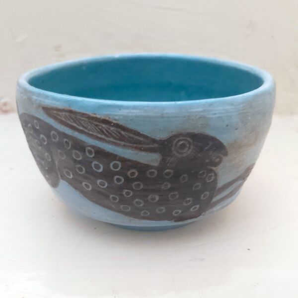9. Hare running tea bowl.