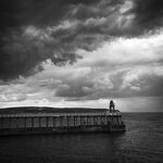 Storm clouds over Whitby harbour
