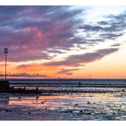 The bait digger at Sundown, Whitstable