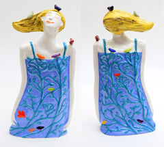 Dreaming of Birds ceramic figure in aqua blue by ceramicist Susan Czopor.