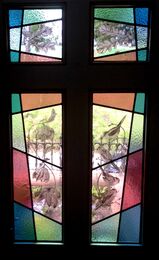 A front door altered to let in light.