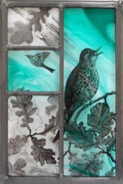 Thrush and oak leaves