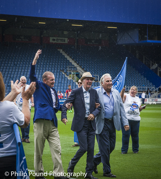 Stan Bowles on the pitch at Loftus Road with Gerry Francis and Don Shanks