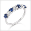 WHITE GOLD DIAMOND AND SAPPHIRE CLAW SET 7 STONE HALF ETERNITY RING