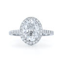 OVAL CUT DIAMOND CLUSTER RING WITH ROUND DIAMOND SHOULDERS
