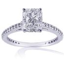 RADIANT CUT DIAMOND RING WITH ROUND DIAMOND SHOULDERS