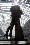 Bronze statue of ` The Meeting Place` at St.Pancras Eurostar Int.Station, London. U.K.