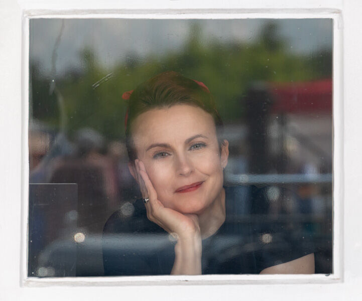 Portrait In A Window