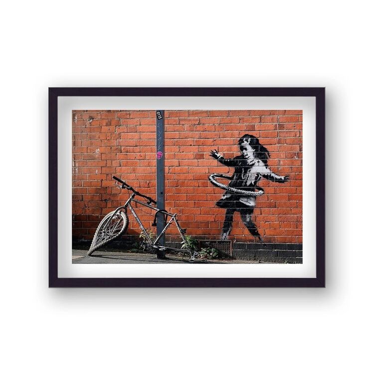 Hula Hooping Girl Framed Art Print by Banksy