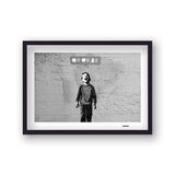Crying Boy Framed Art Print by Banksy
