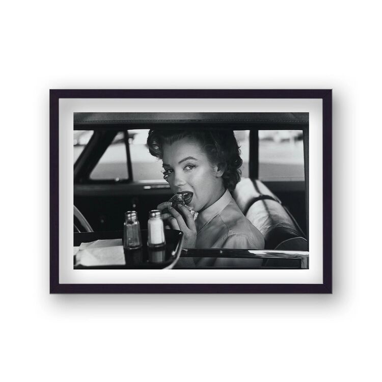 Marilyn Monroe Portrait in Car Eating Burger in Drive-Thru Framed Art Print from the Marilyn Monroe Collection