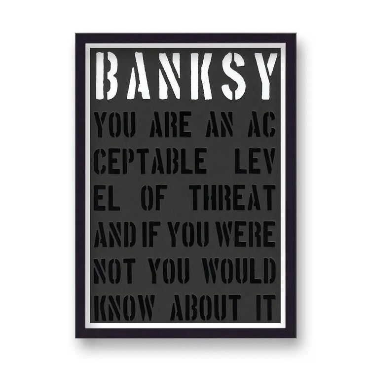 Acceptable Level of Threat Framed Art Print by Banksy