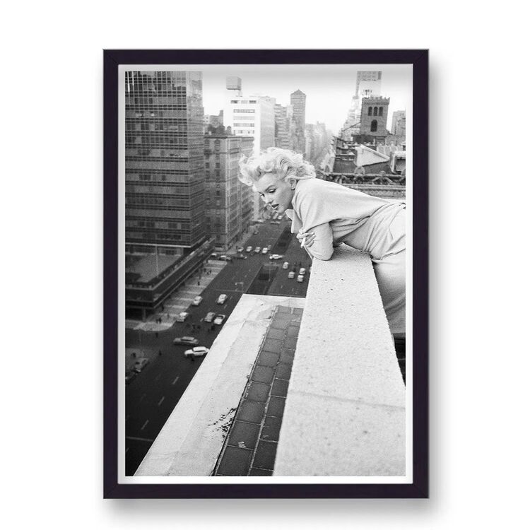 Marilyn Monroe in New York Looking To Street from Rooftop Framed Art Print from the Marilyn Monroe Collection