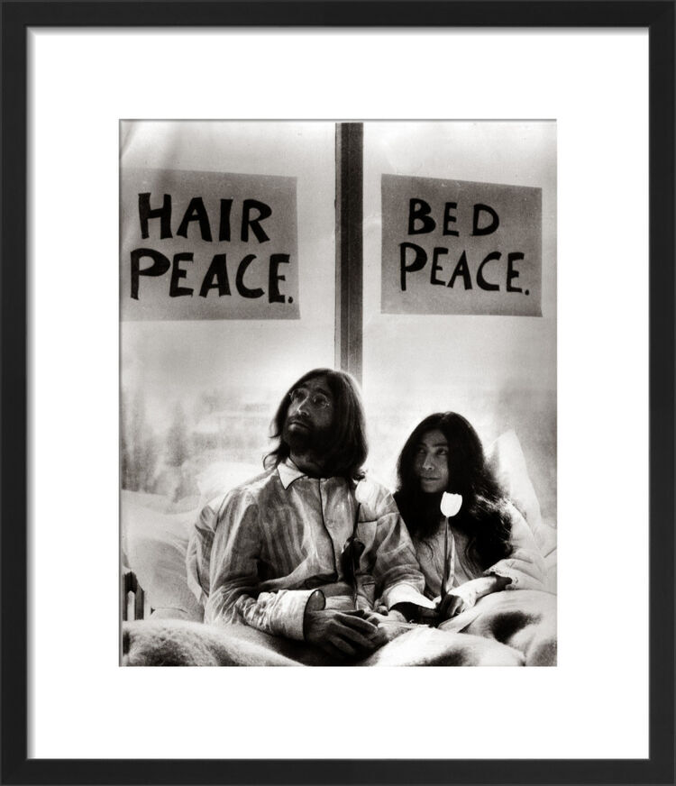 John Lennon in bed with Yoko Ono Framed Art Print by Mirrorpix