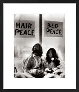 John Lennon in bed with Yoko Ono Framed Art Print by Mirrorpix