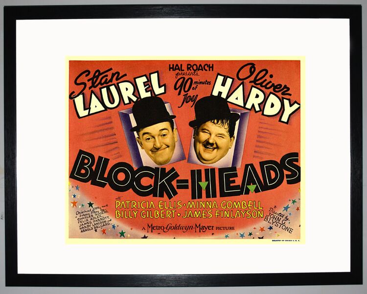 Block Heads Framed Art Print by Film Classics